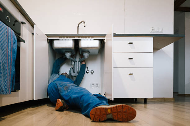 Professional Drain Cleaning technician working in Stonington, IL